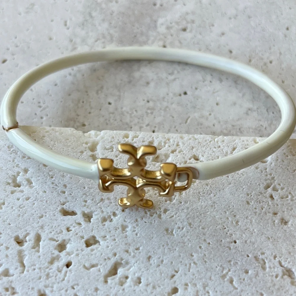 Tory Burch Elegant White Enamel and Gold Accent Women’s Bangle